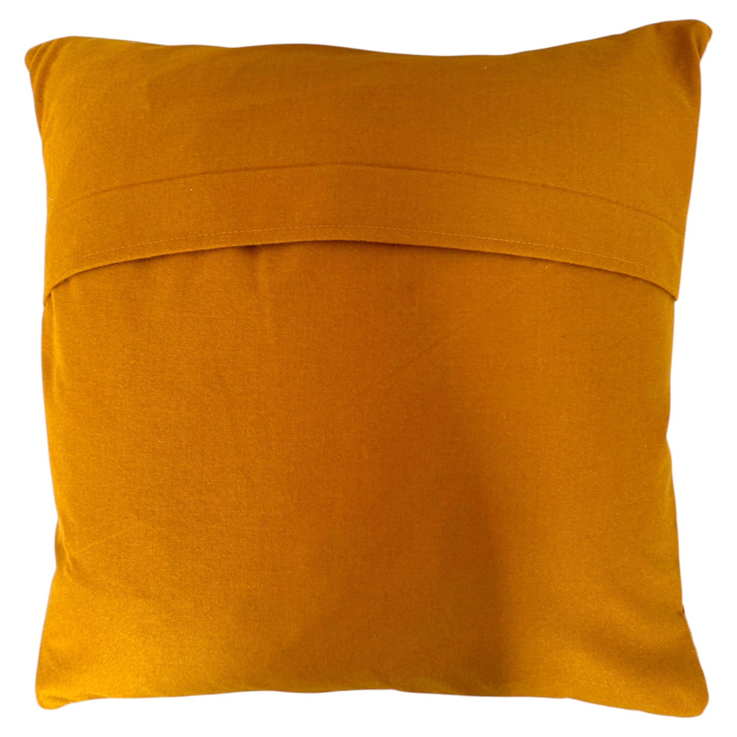 Back view of a square Banjara cushion, showing turmeric material with a folded top edge, shown against a plain white background.