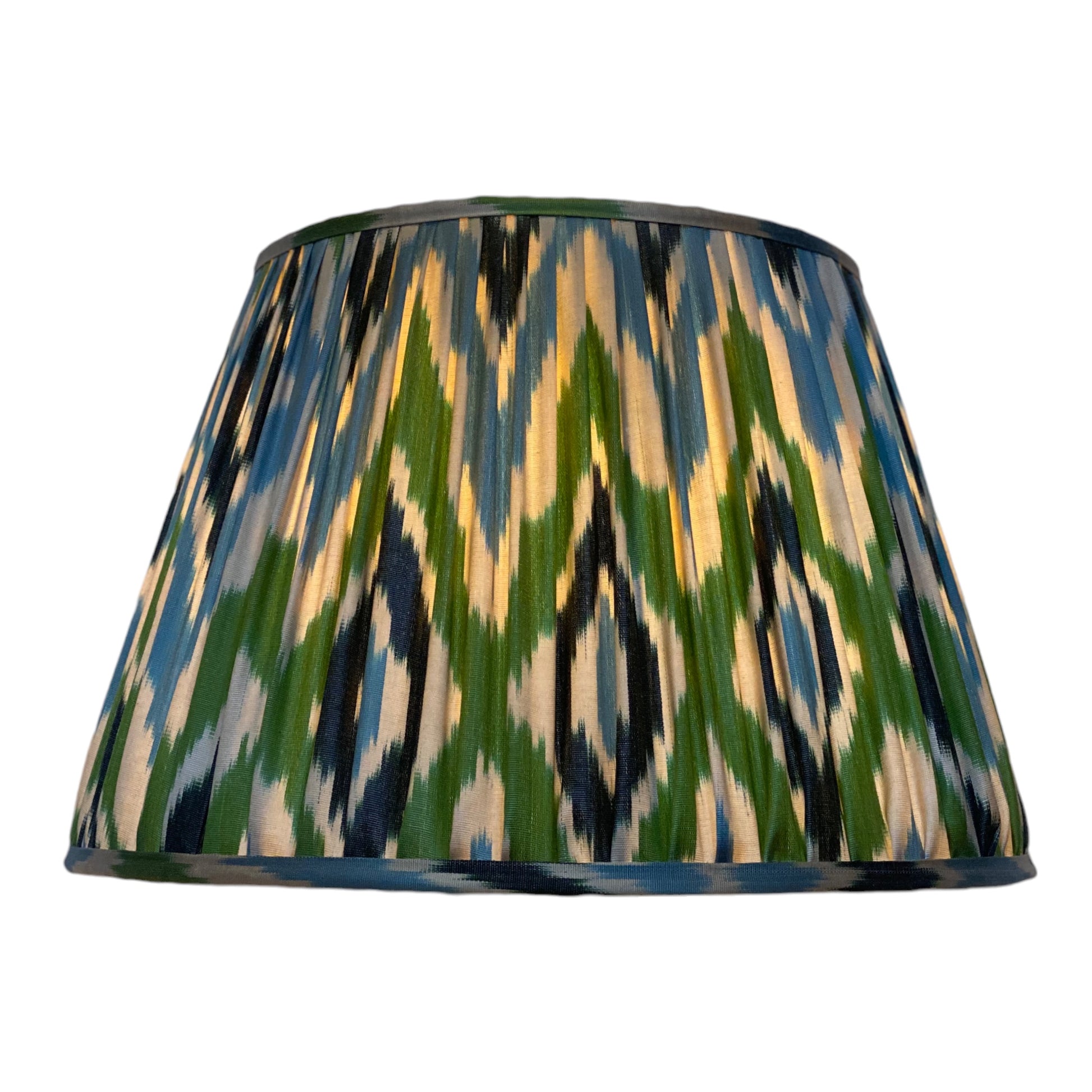 Blue and green ikat silk lampshade lit