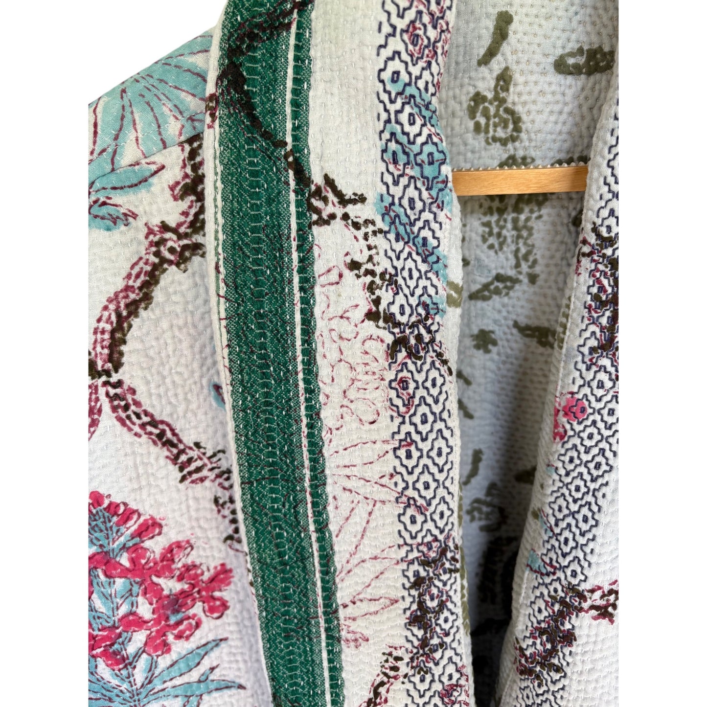 Moghul blue and pink short coat close up