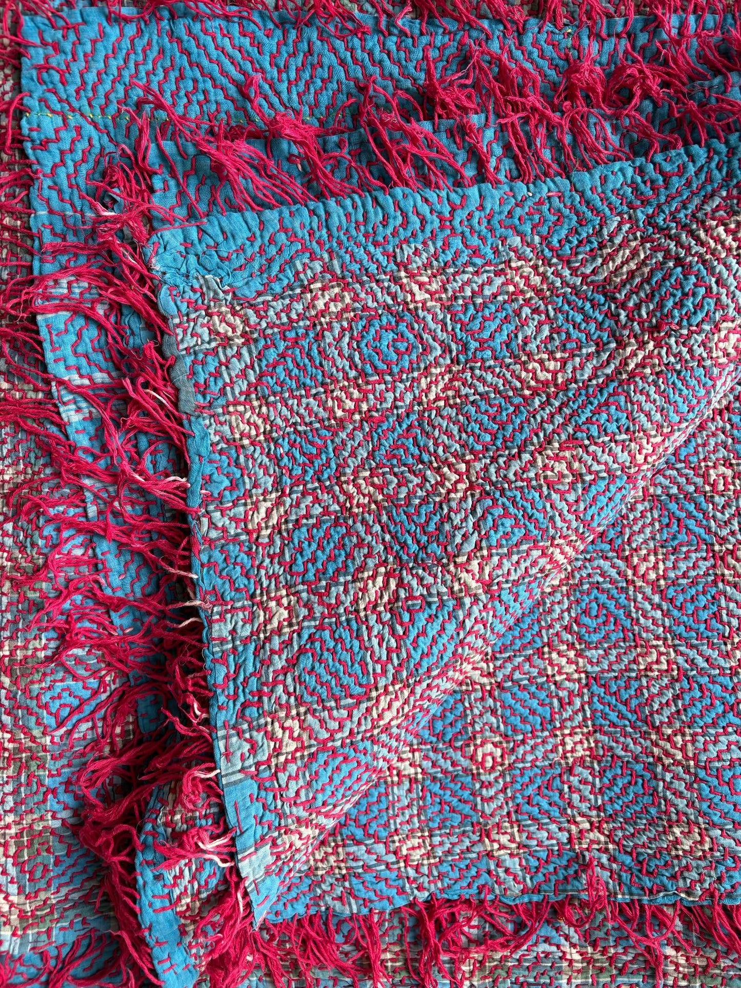 blue and red kantha rug