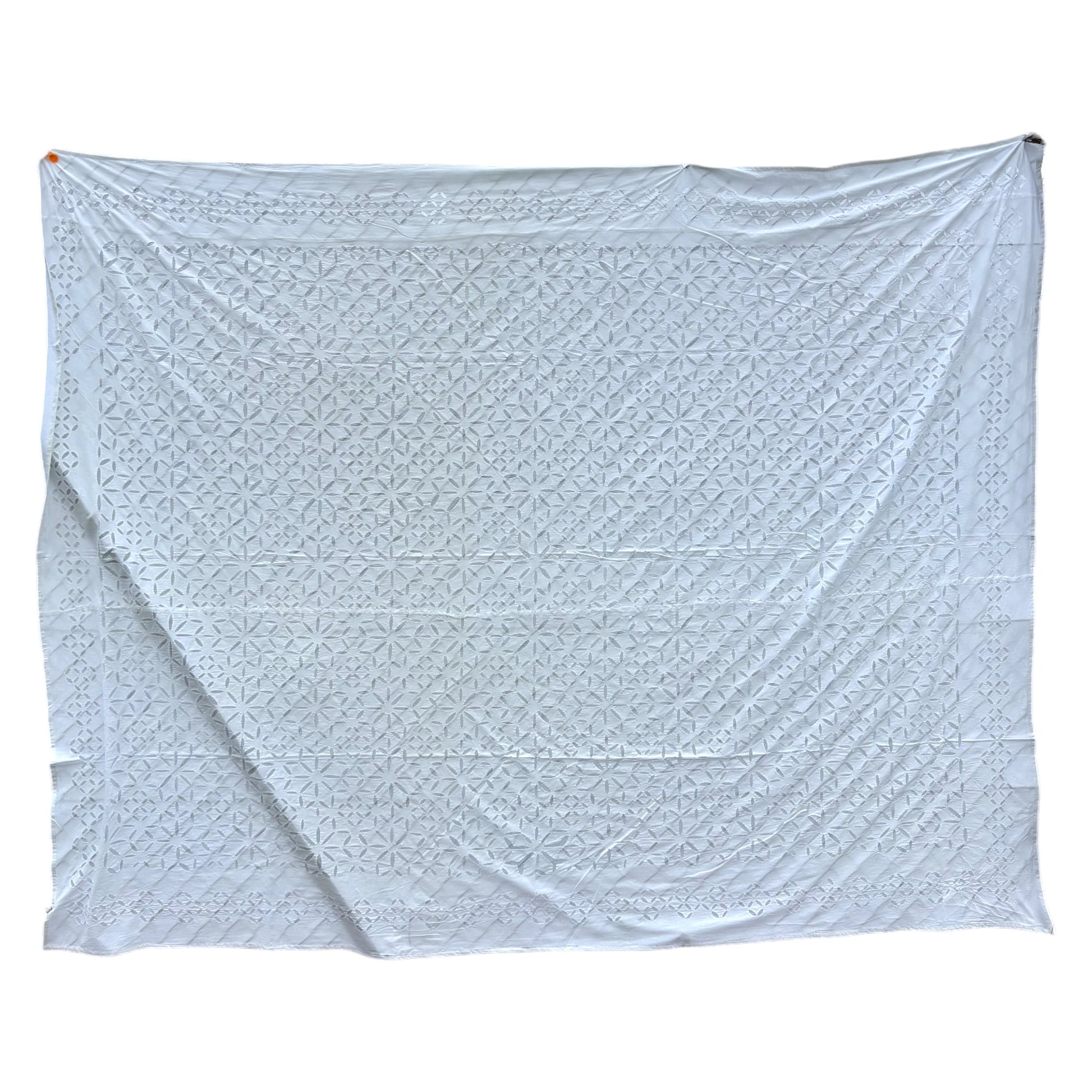 White cutwork cotton blanket