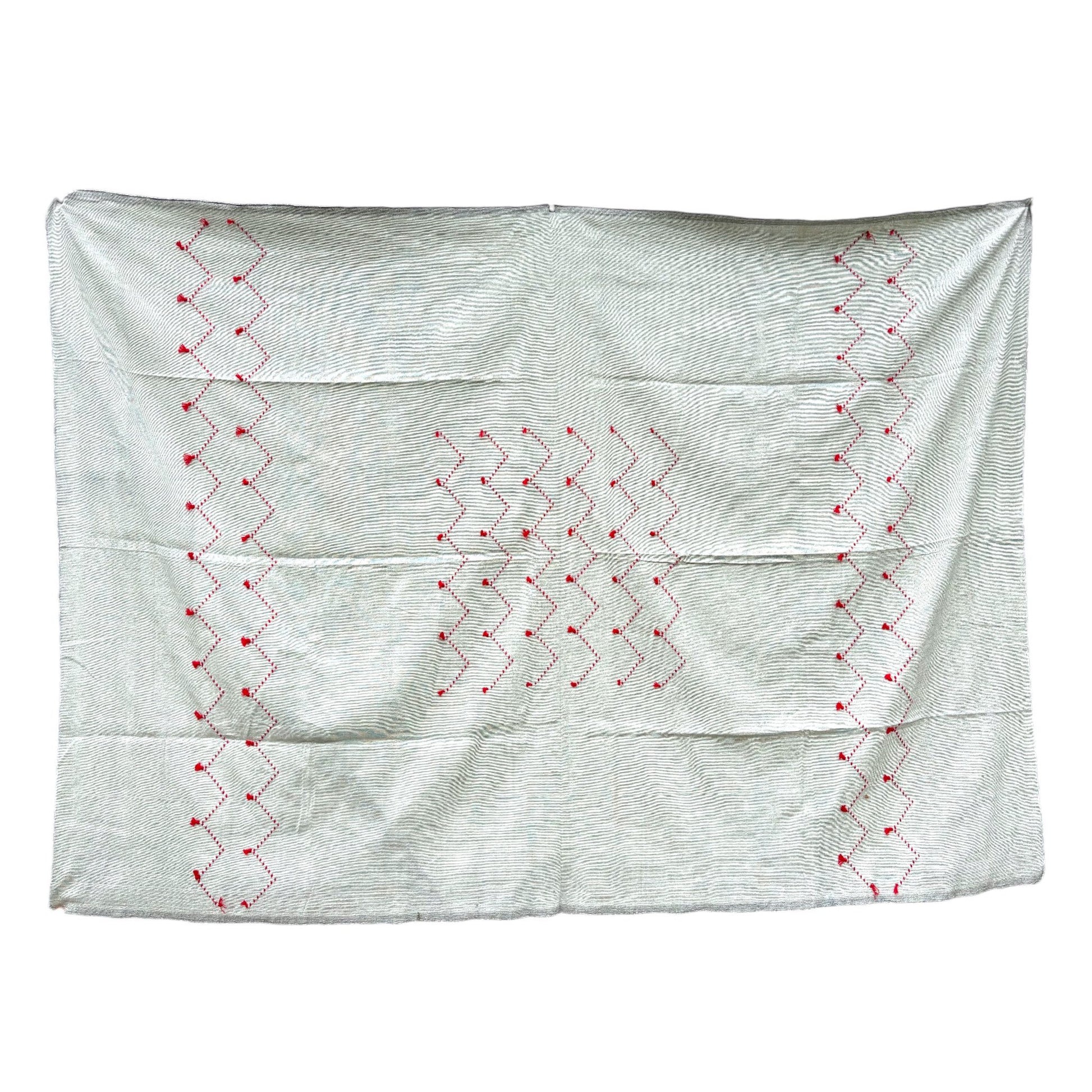 Grey with red bedspread