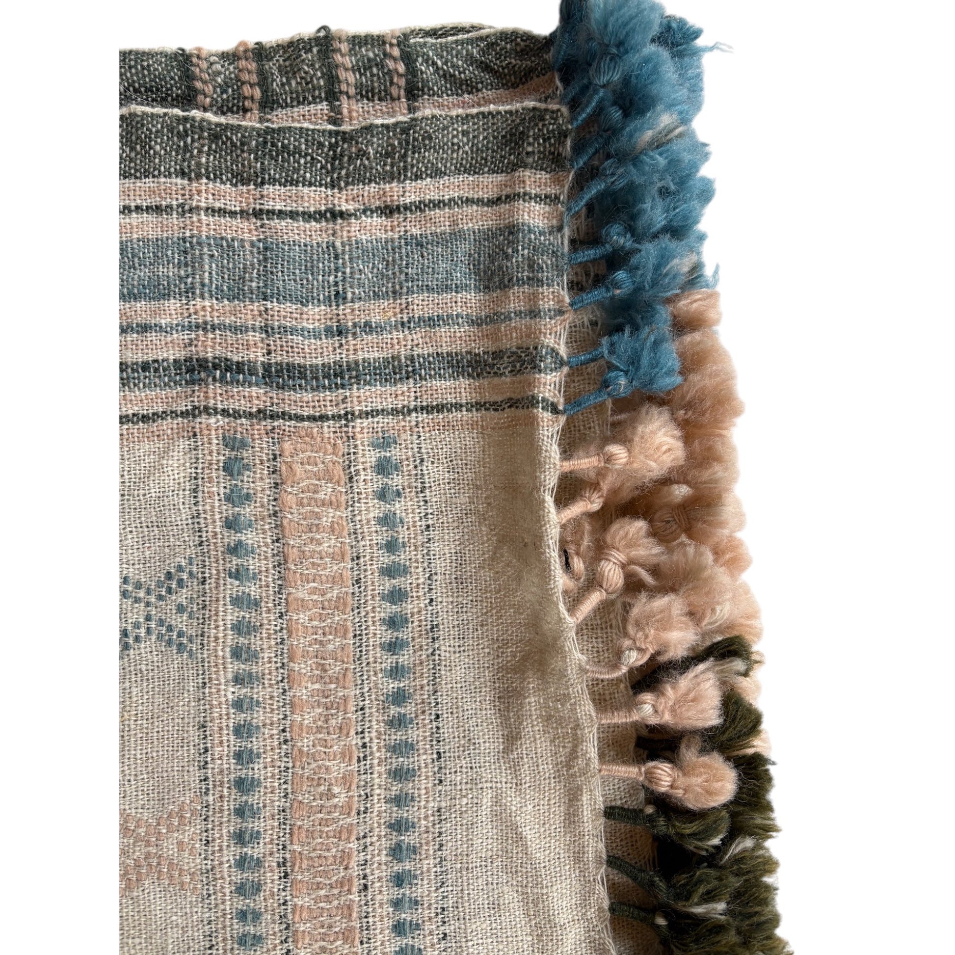 pink and blue woollen throw