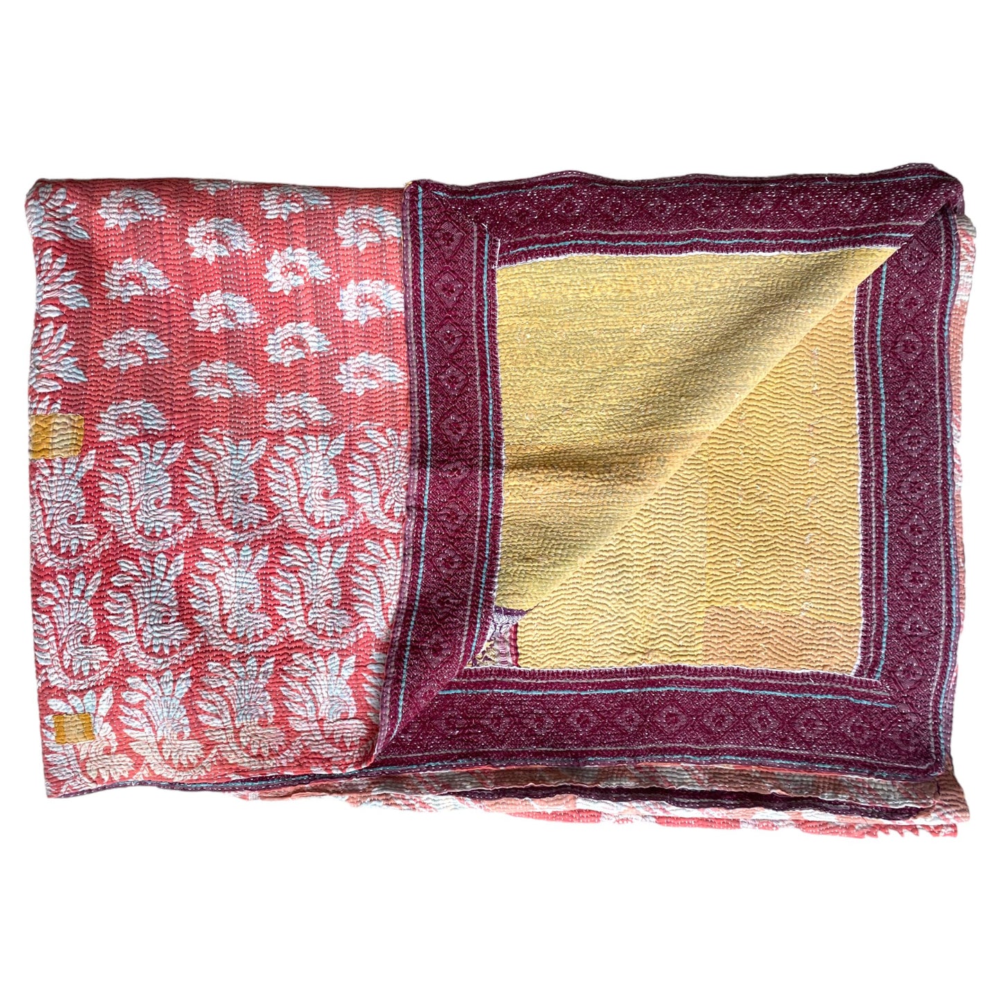Pink and white kantha quilt