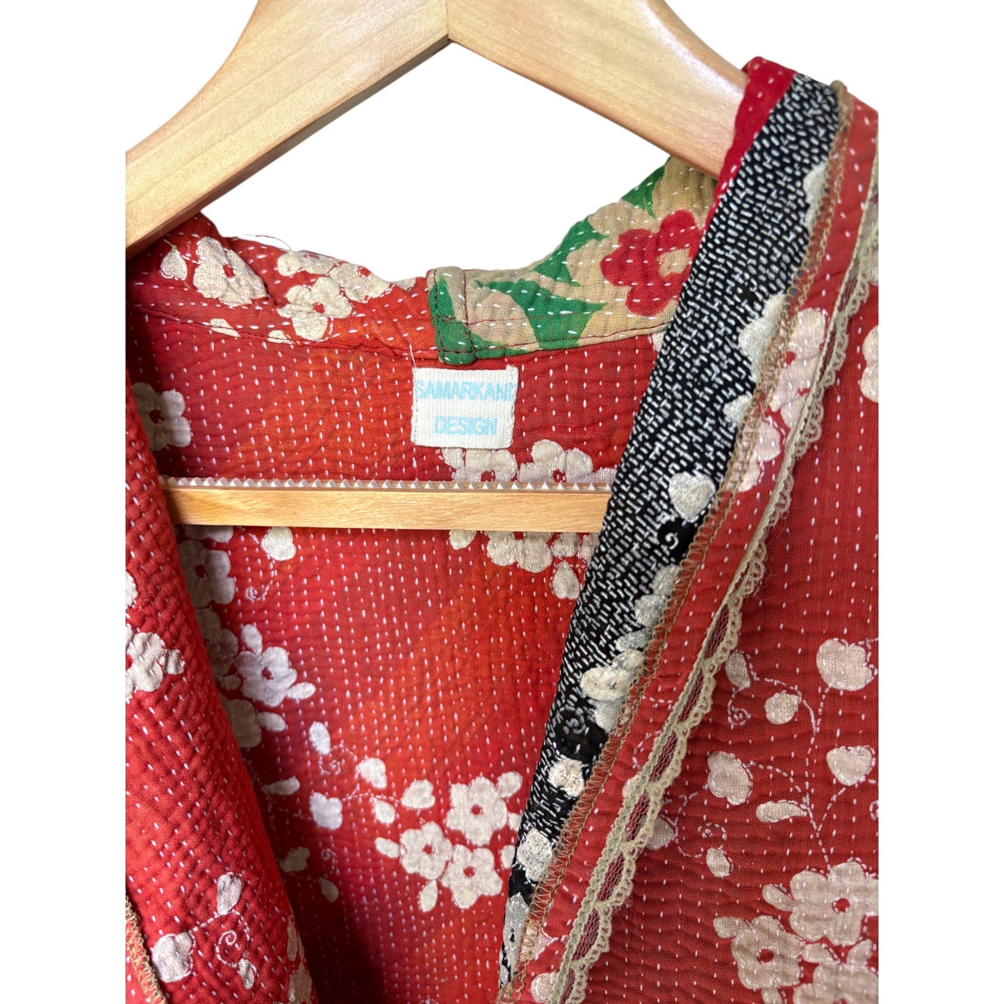 Red kantha coat close up