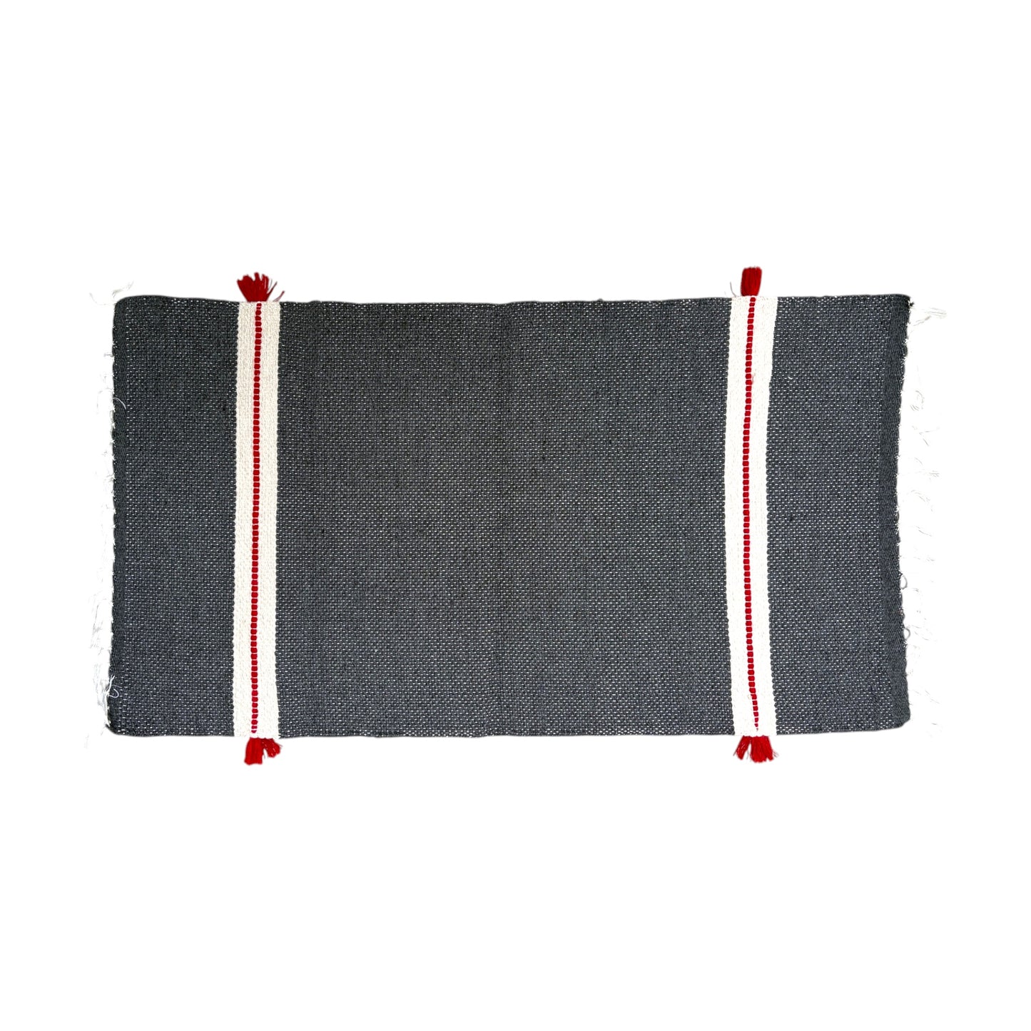 A rectangular dark gray bath mat featuring two vertical white stripes with red borders and red tassels at the ends, shown flat against a white background.