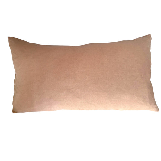 The back view of a rectangular Swat Valley Wedding Cushion in a soft, dusty rose pink fabric.