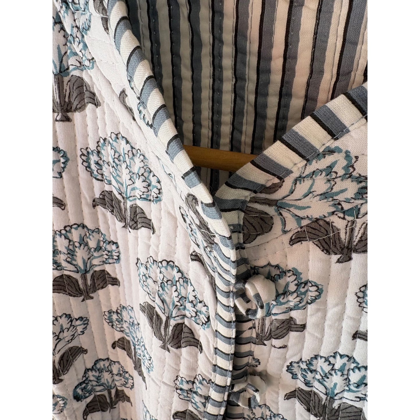 Close up quilted blcok print coat