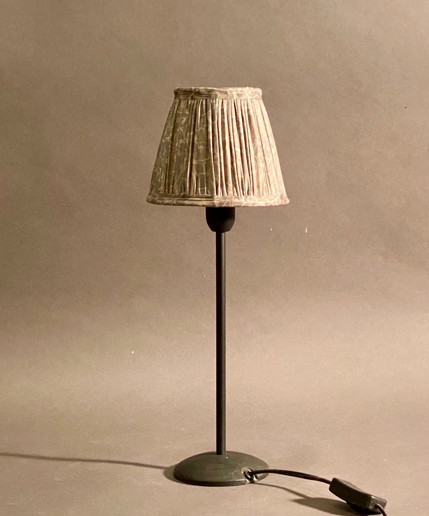 Pale Blue silk sari lampshade shown on a candle stick lamp base