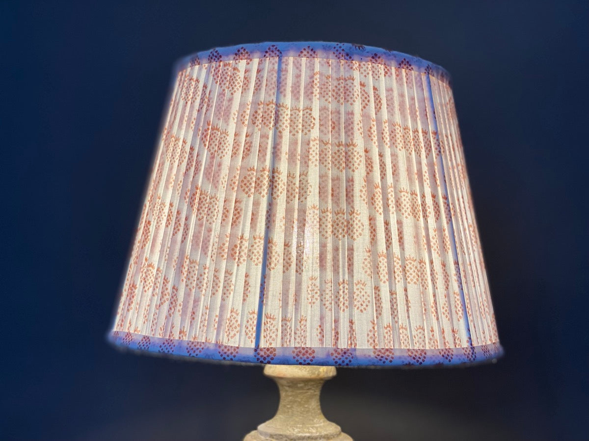 Orange and white pineapple shade lit