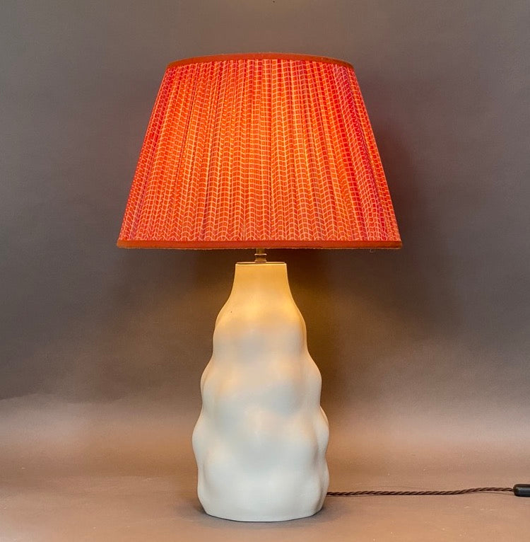 noughts and crossed lampshade lit