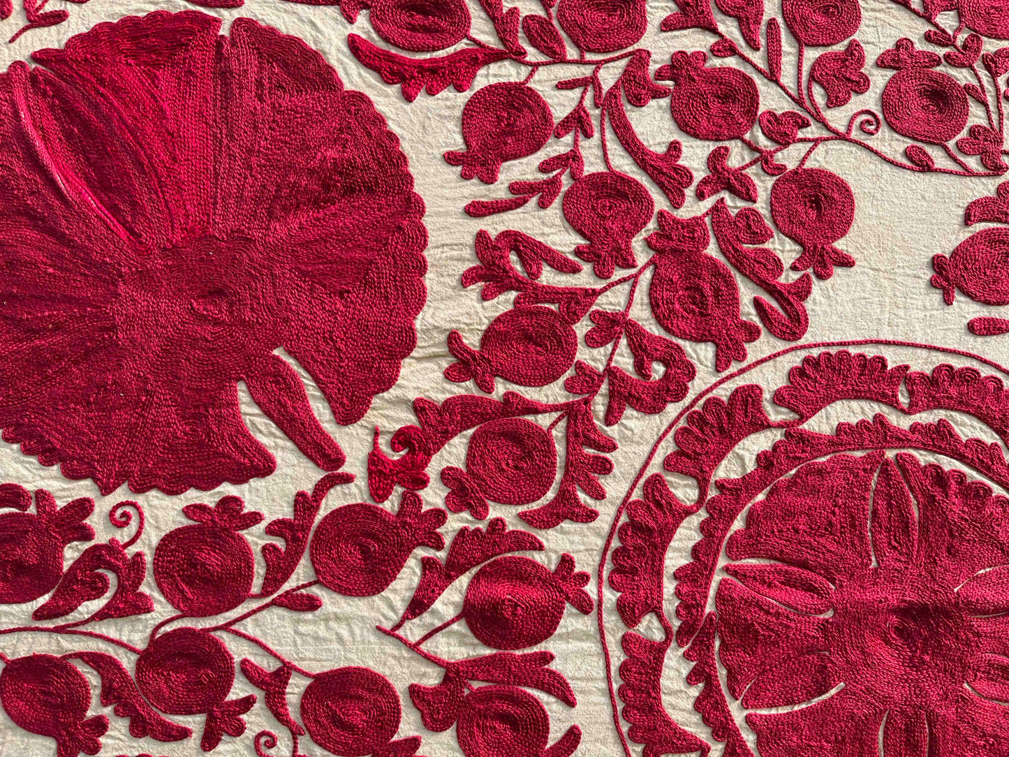 Red oatmeal Suzani close up