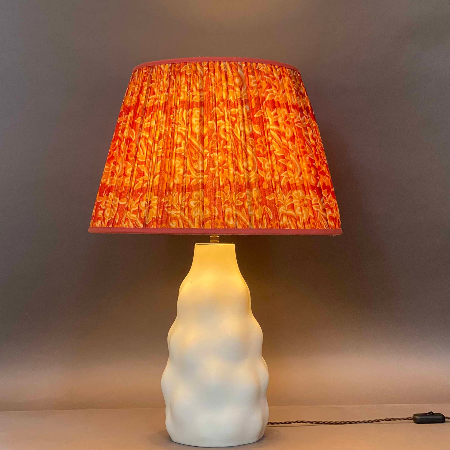 Russet and ochre vintage silk sari lampshade lit