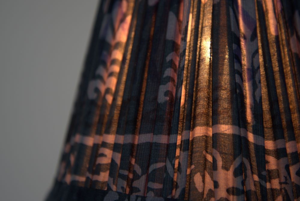 Indigo tussar silk lampshade close up shown lit