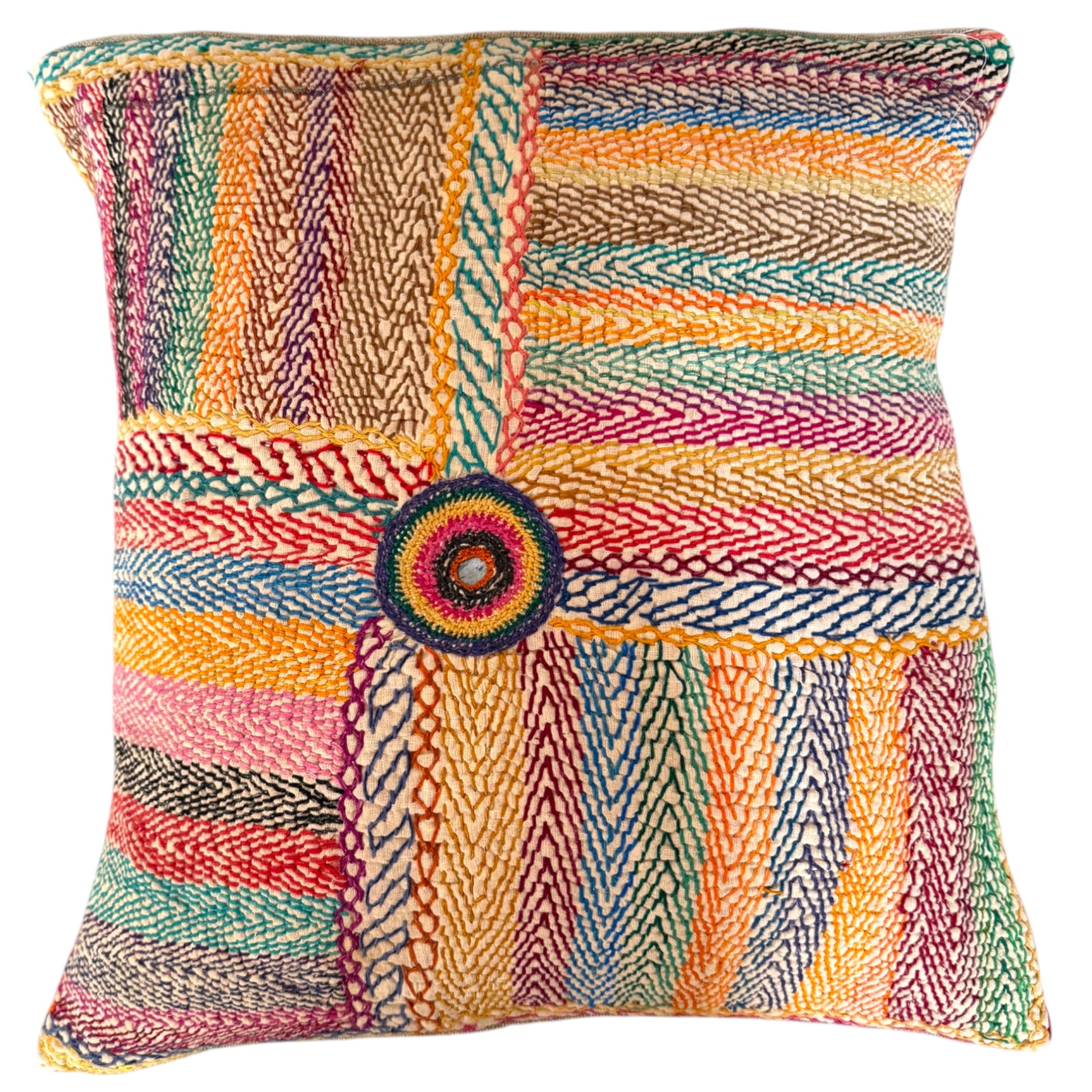 Front view of Banjara rainbow embroidered cushion on cream base with multicolour chevron stripes and mirror-work circular medallion.