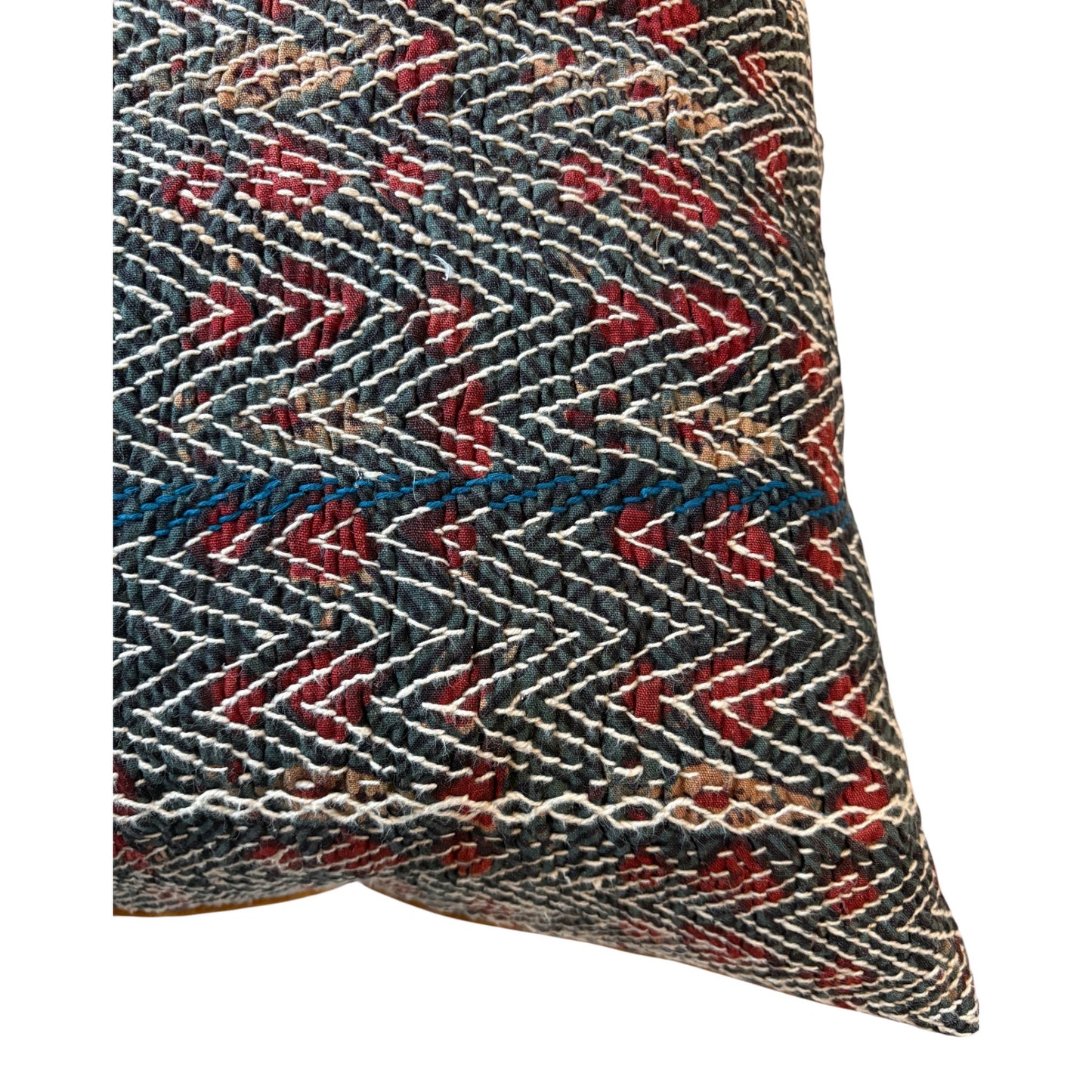 blue and red banjara cushion close up