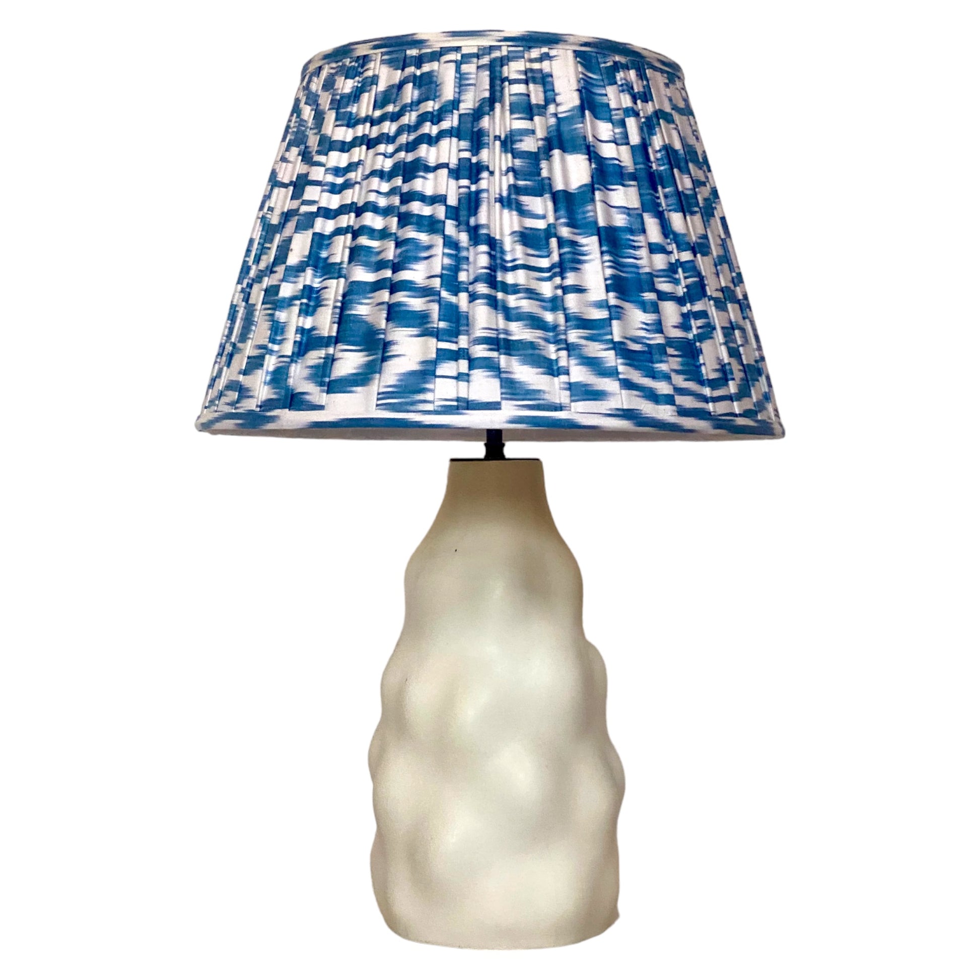 Blue and white ikat lampshade on IKI lamp