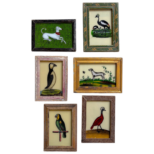Six small framed vintage animal paintings arranged on a white background, featuring various birds and dogs in rustic wooden frames.