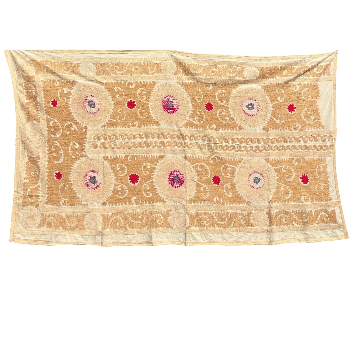 Whole view of a vintage, square, honey-gold and cream embroidered Suzani, from Uzbekistan, featuring intricate geometric patterns and circular floral motifs in red, pink, and teal.