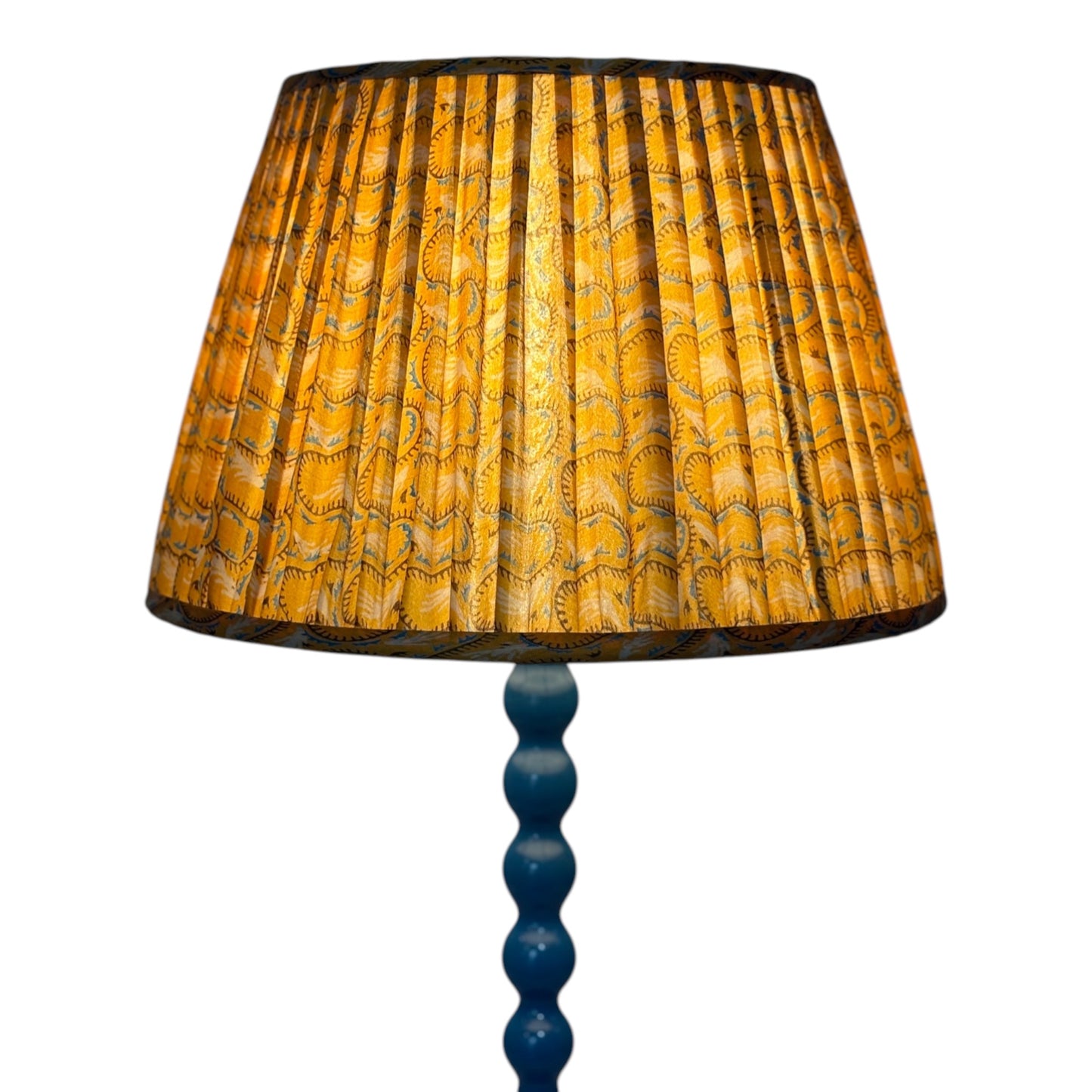 Gold lampshade lit