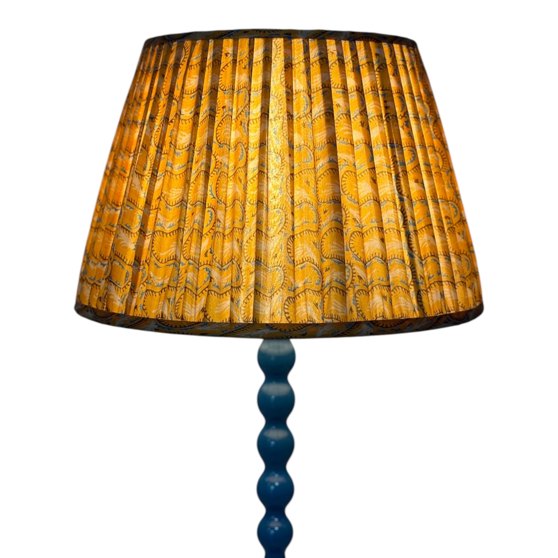 Gold lampshade lit