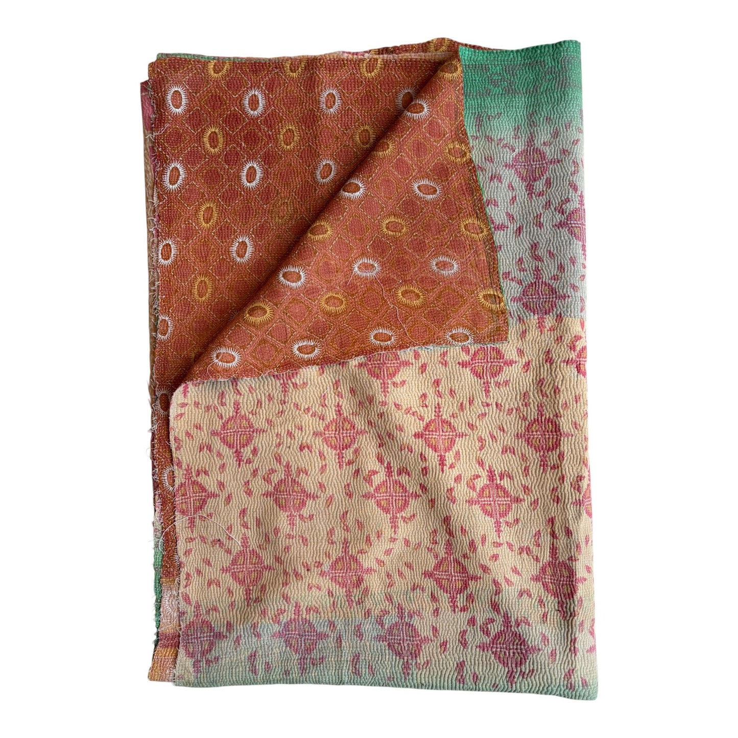 Green and red kantha quilt
