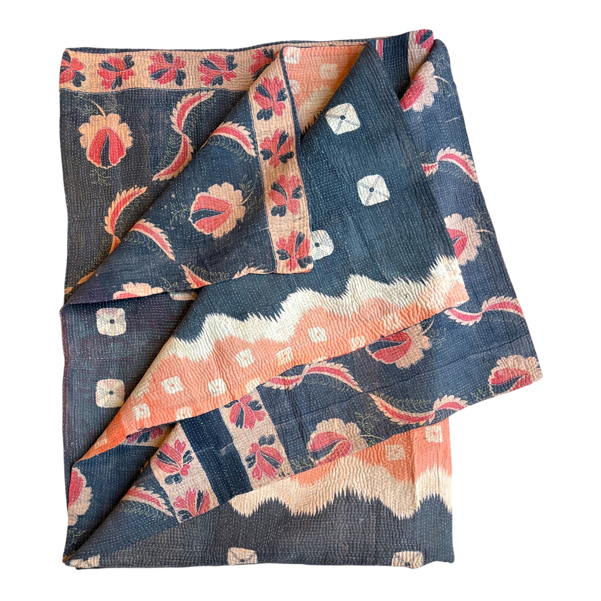 Indigo and pink kantha quilt folded
