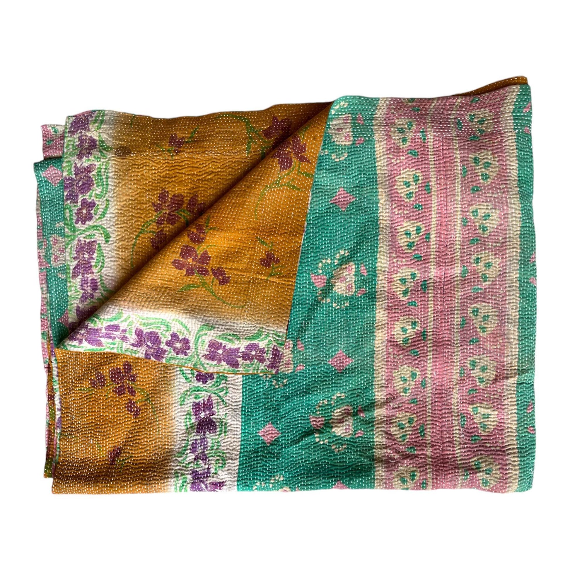 Jade pink and amber kantha quilt