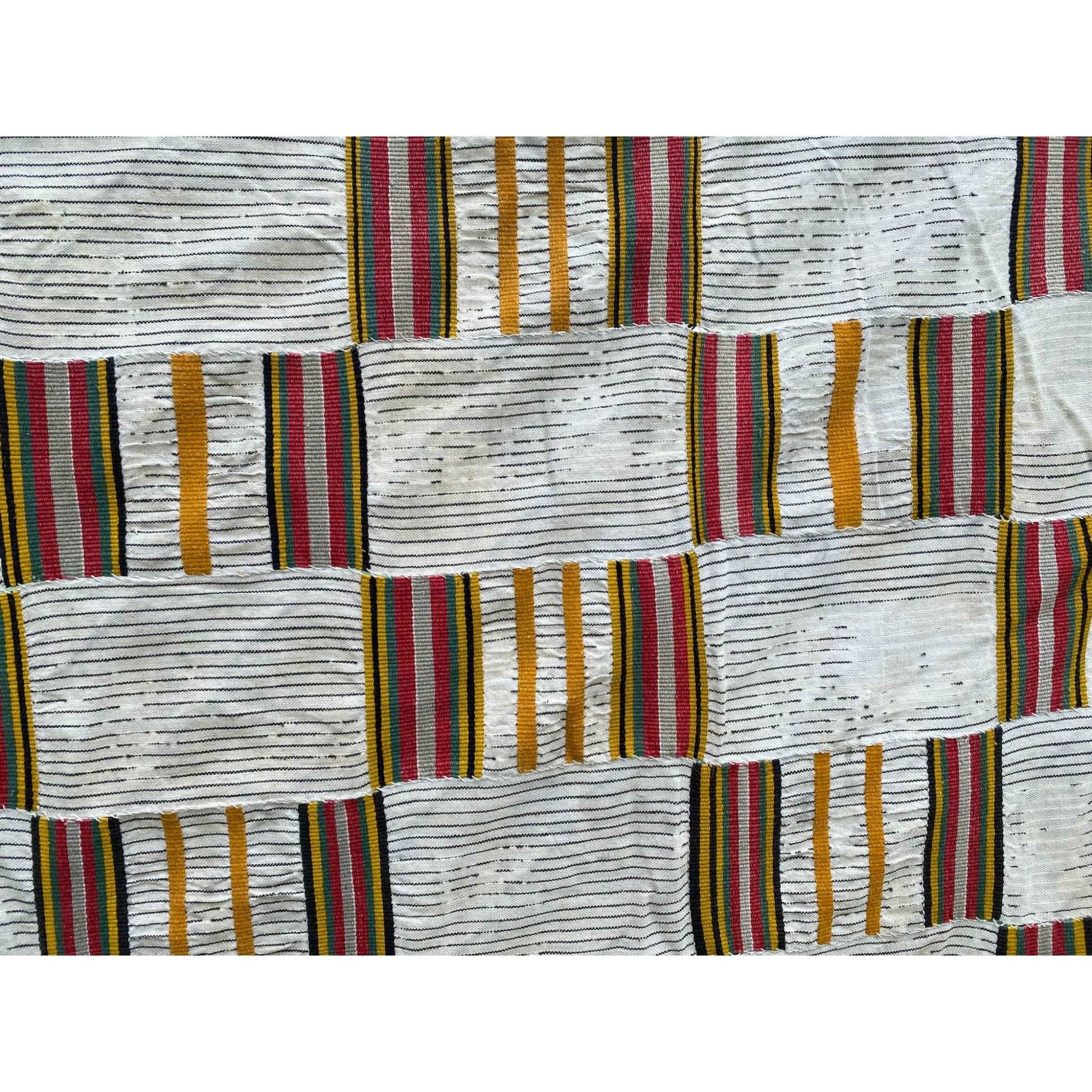 Kente cloth with red and yellow close up