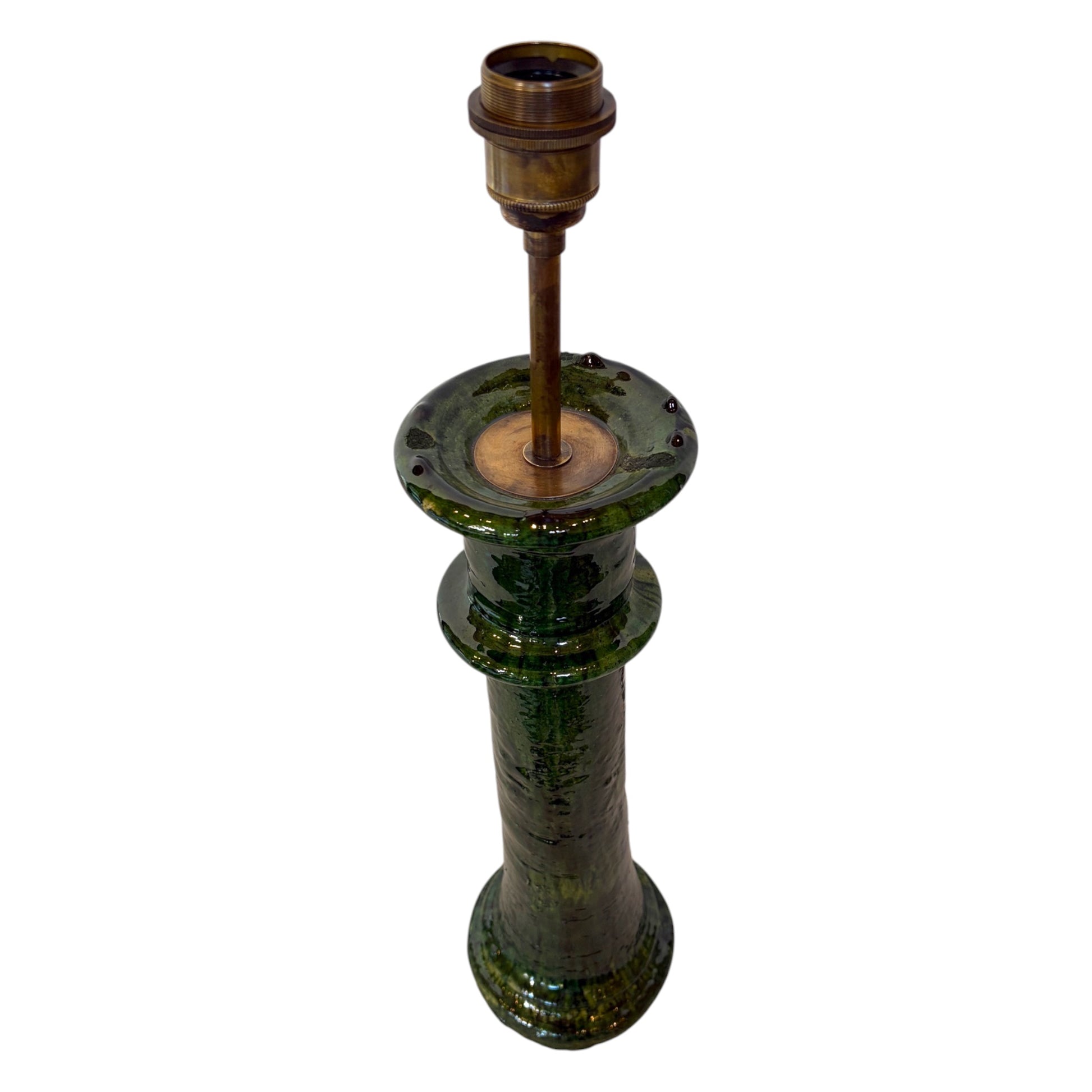 Close-up of Tamegroute lamp base showing green glaze and antiqued brass E27 bulb fitting.
