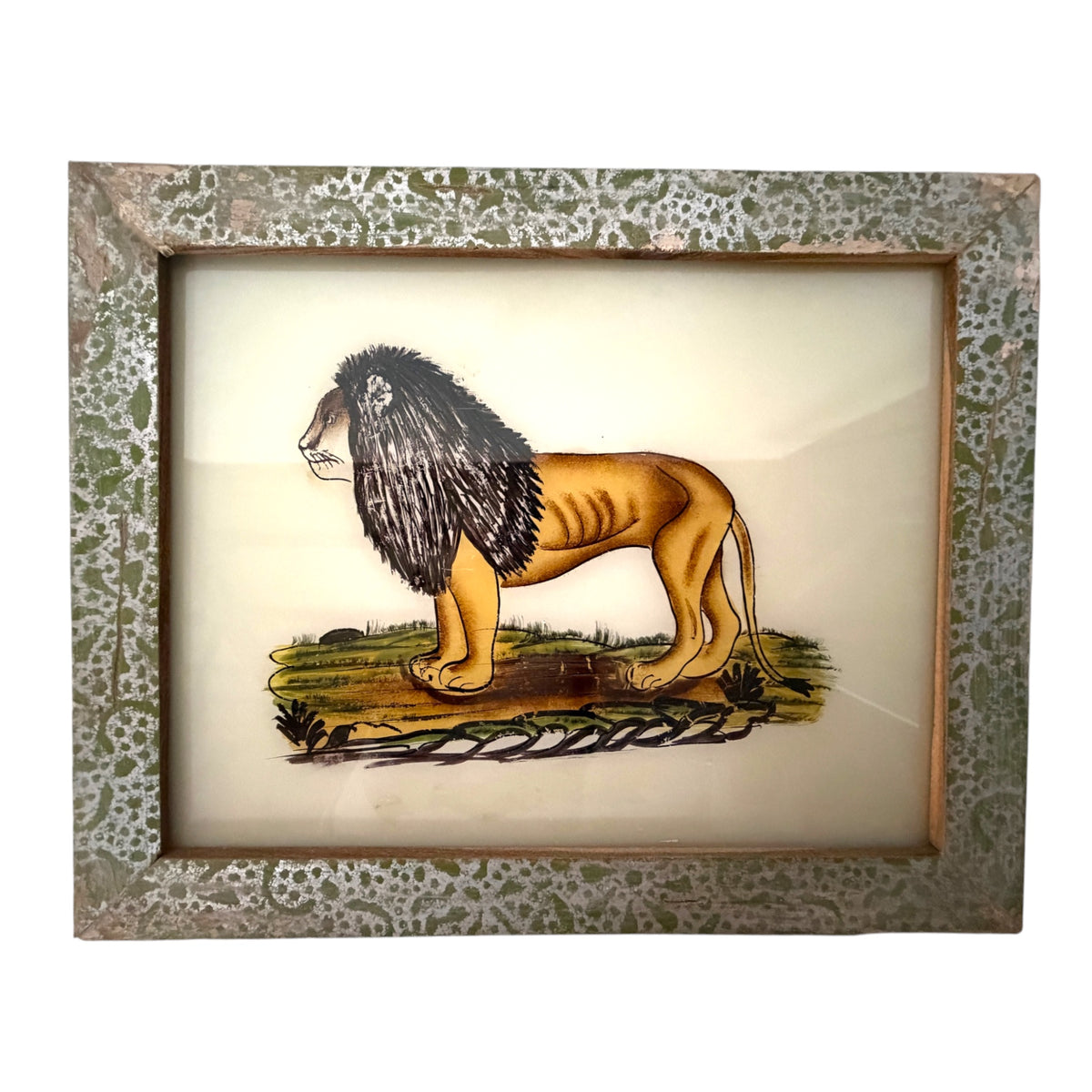 Hand-painted maned lion standing on grassland, reverse glass painting in a green and silver patterned frame