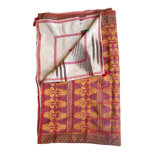 Magenta and yellow kantha quilt