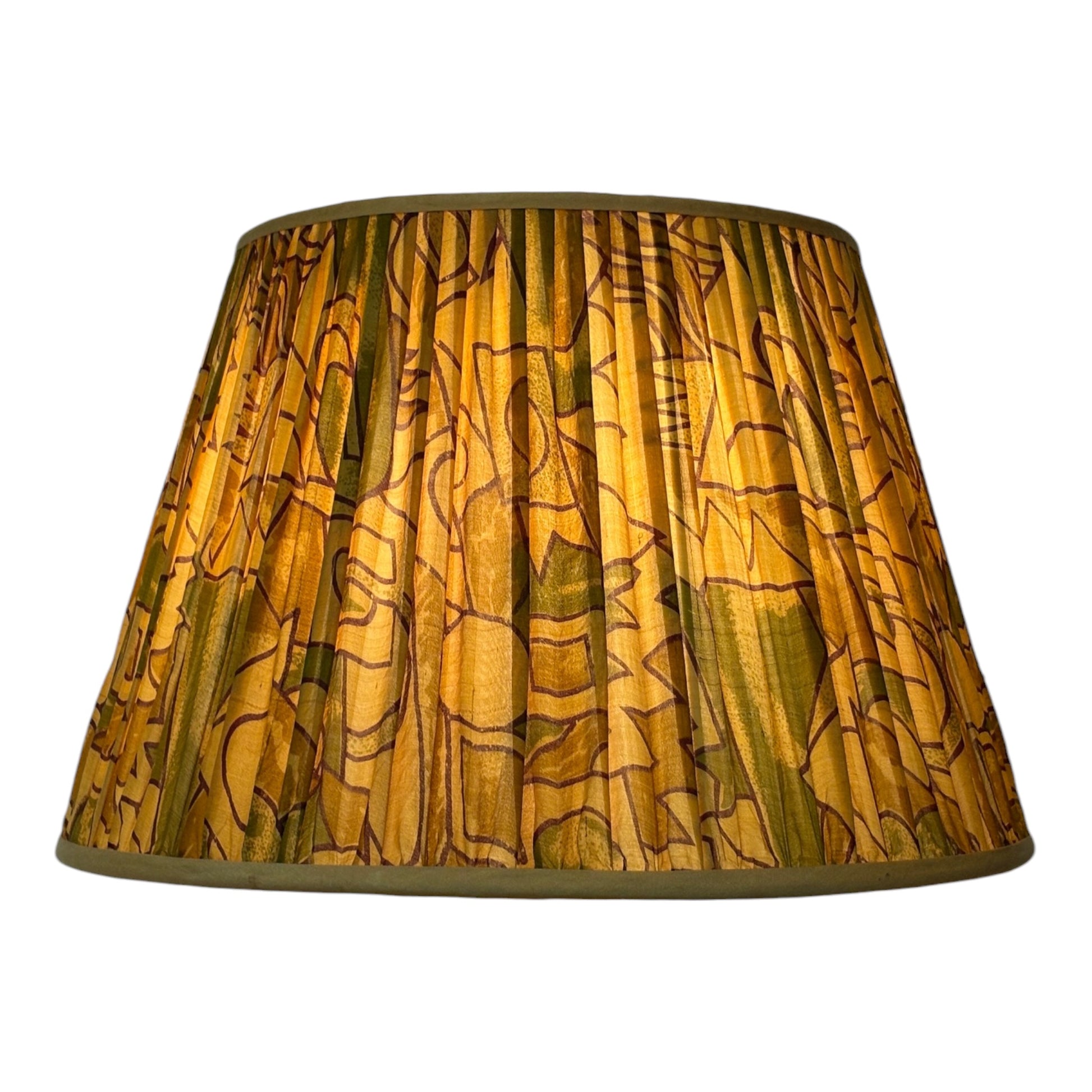 Ochre geometric lampshade lit