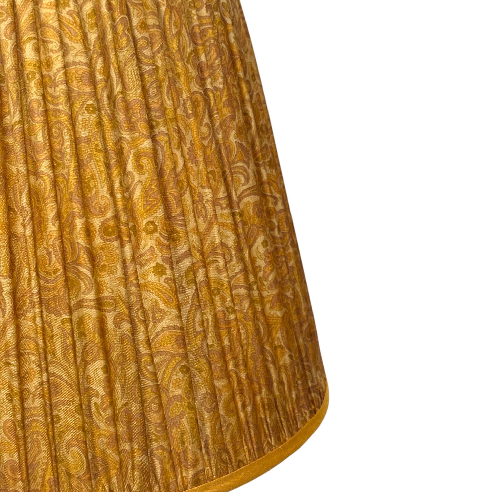 Close up of old gold silk lampshade

