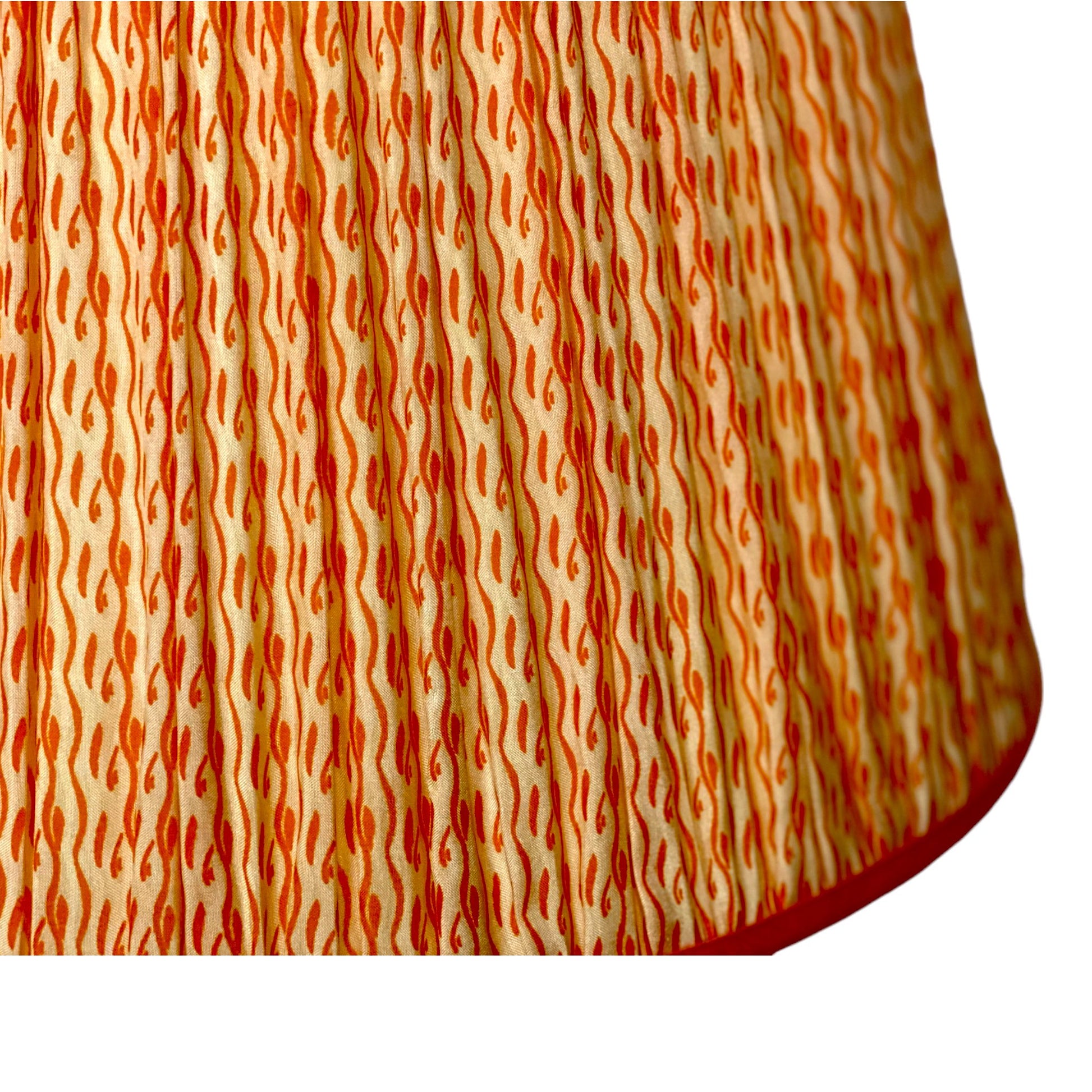 Orange tadpole silk lampshade close up