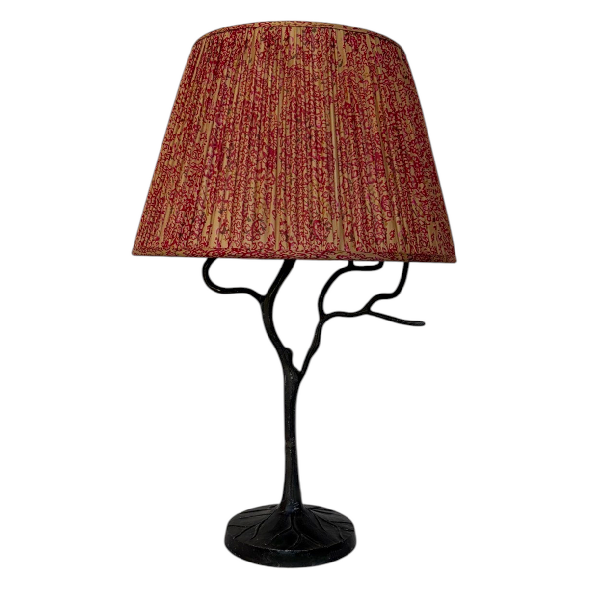 Raspberry & Champagne gathered silk lampshade with a pink vine print on a black cast-metal tree-branch table lamp