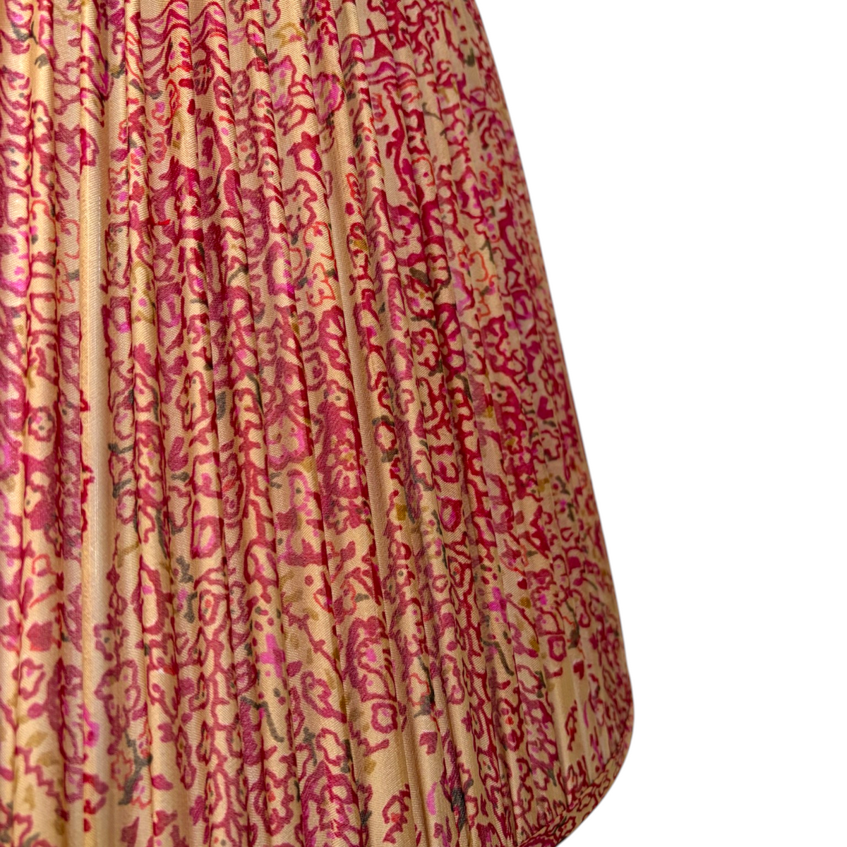 Close-up of the gathered silk and fine raspberry pink vine print on the Raspberry & Champagne lampshade