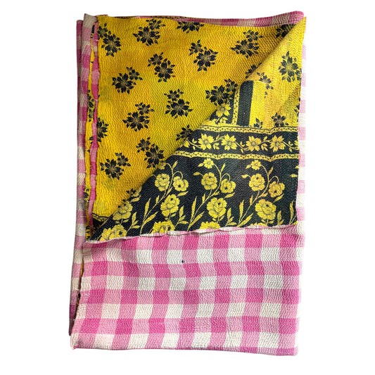 Pink check kantha quilt with yellow floral back
