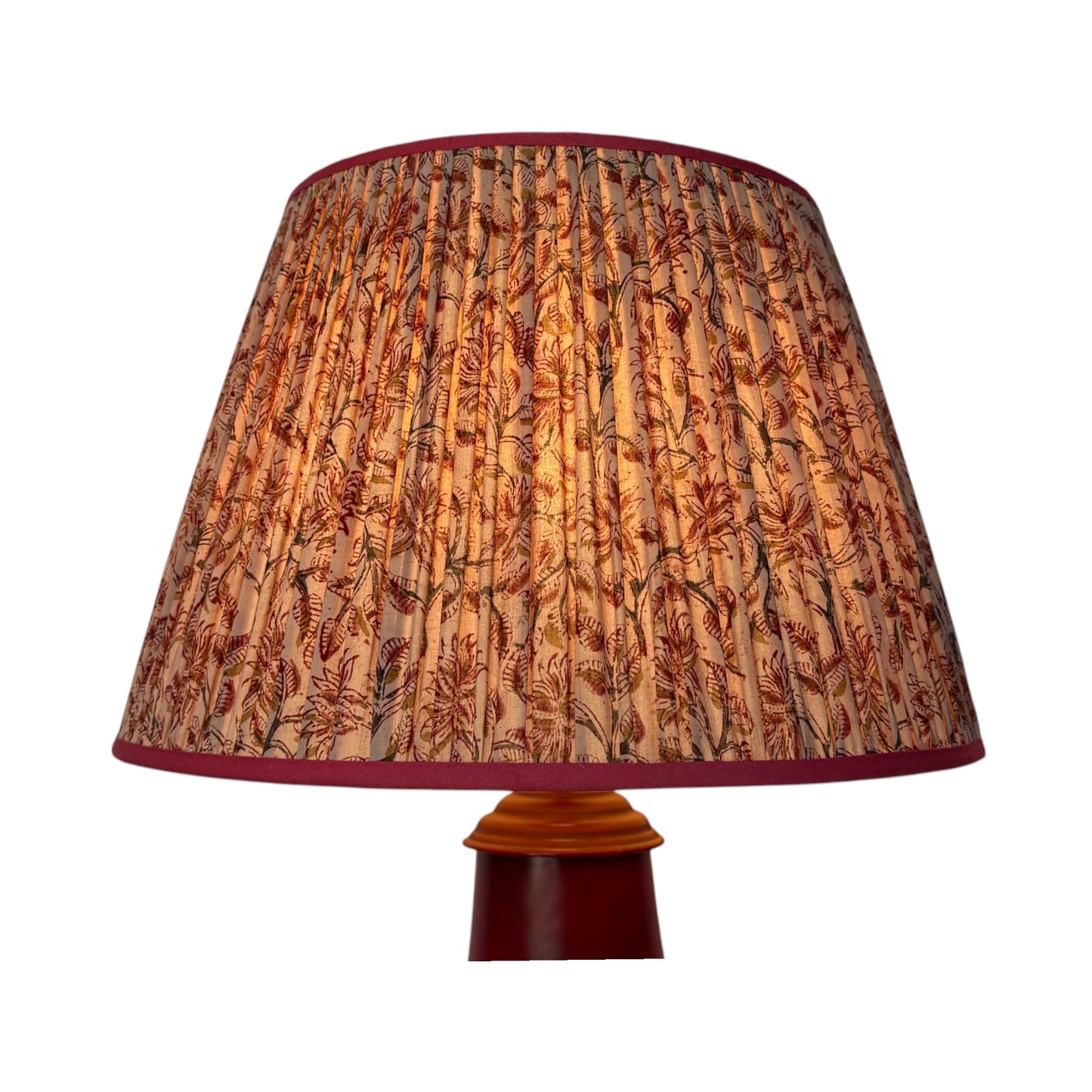 pink and ochre kalamkari lampshade lit
