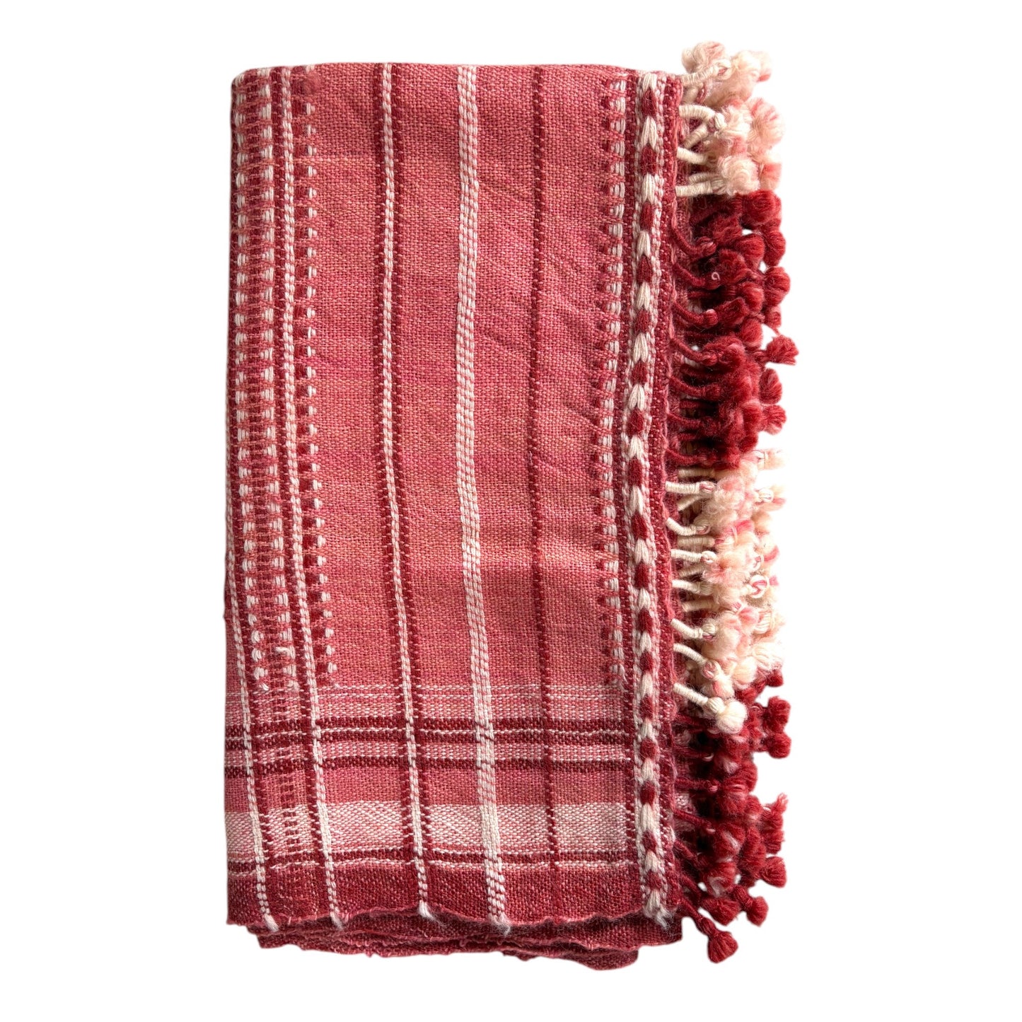 Pink and red woollen throw
