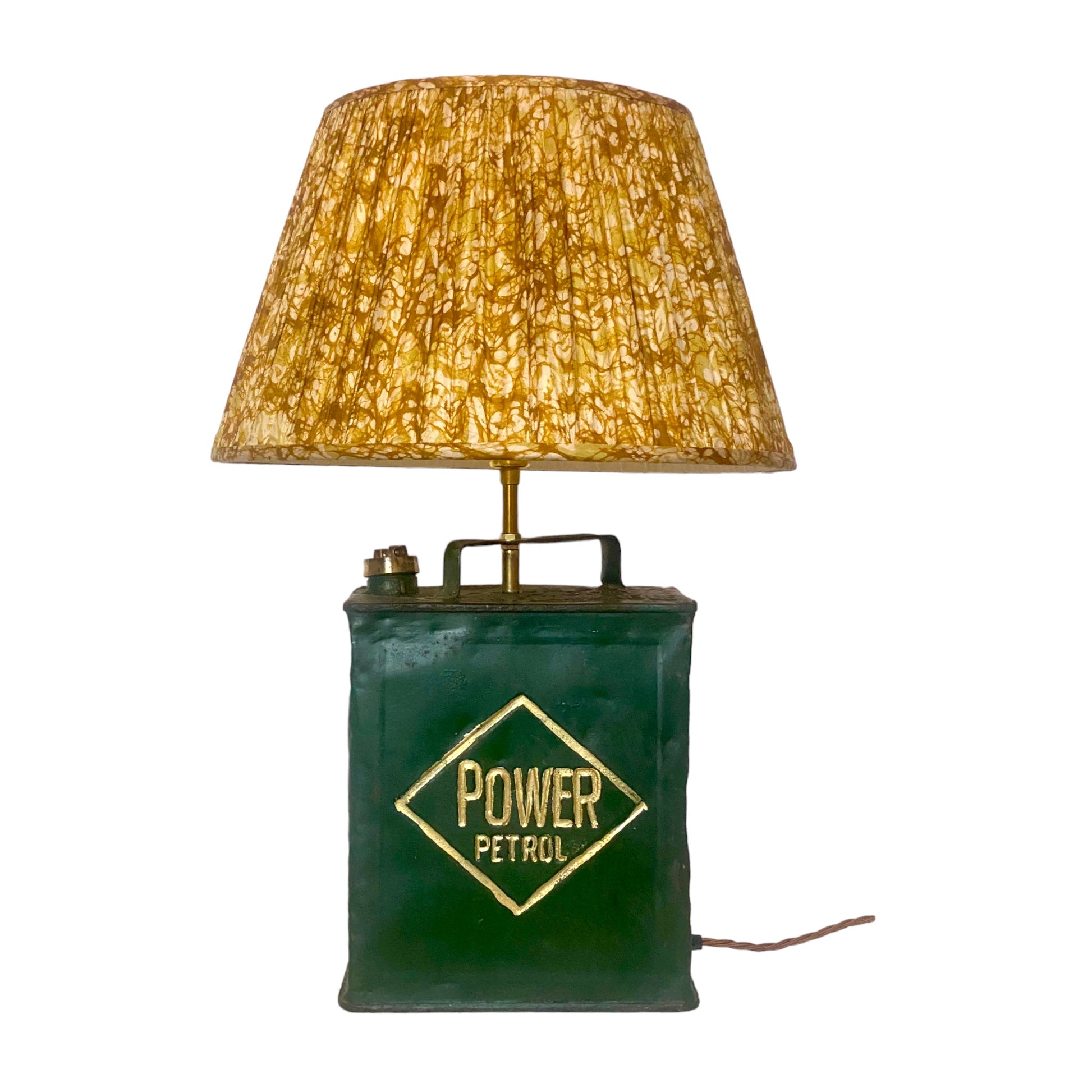 Yellow and brown batik lampshade on Petrol lamp