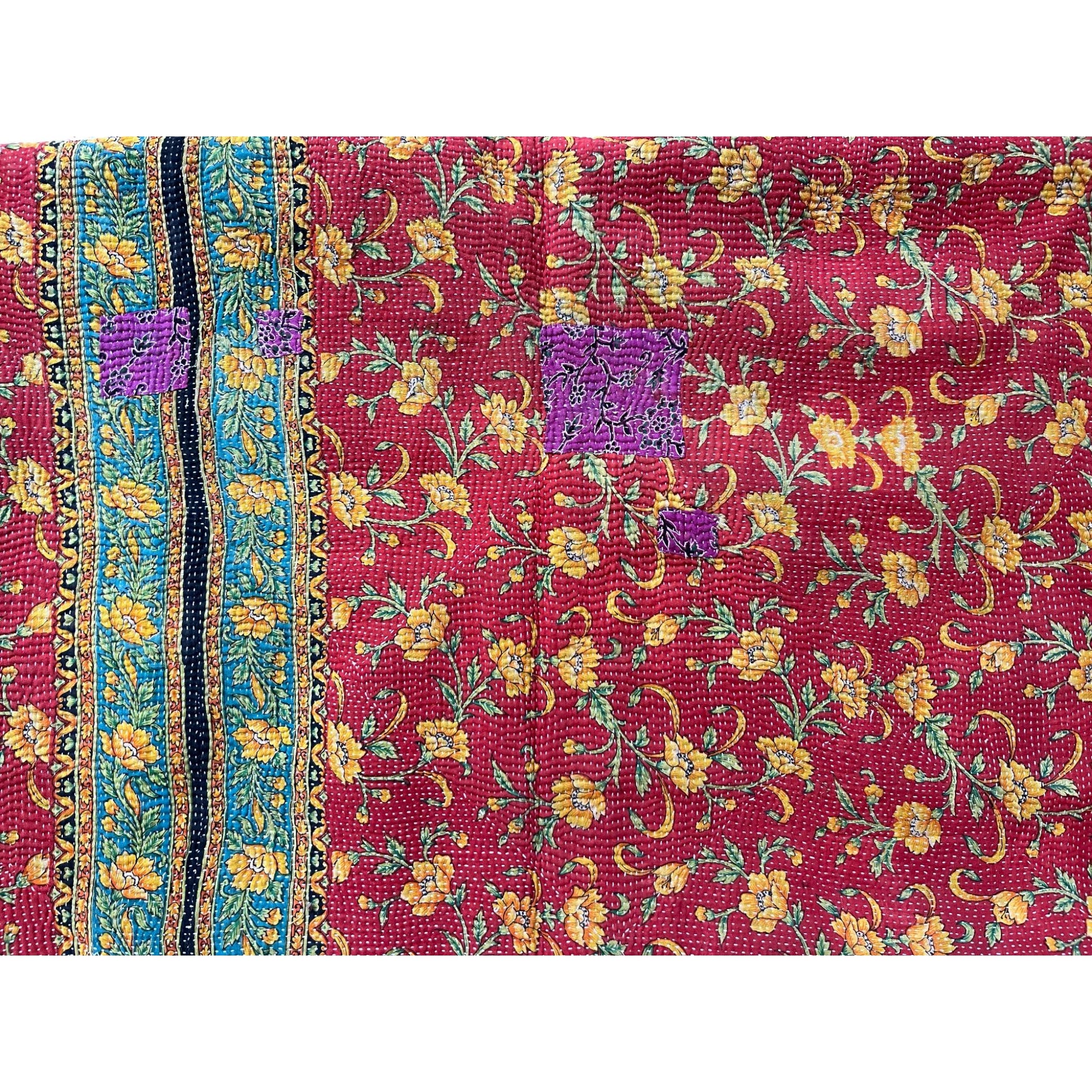 Red with blue kantha quilt