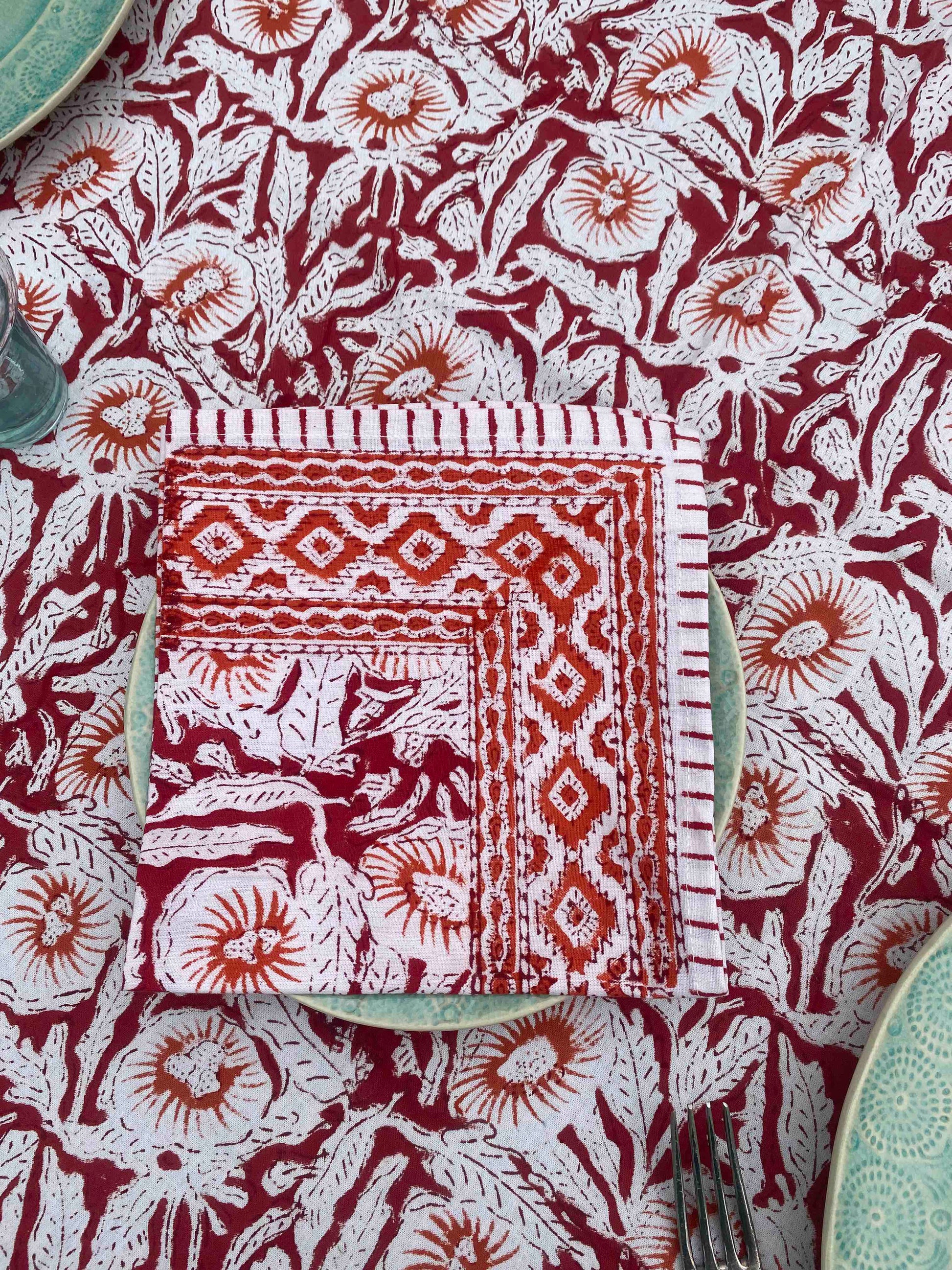 Red and orange tablecloth and napkins