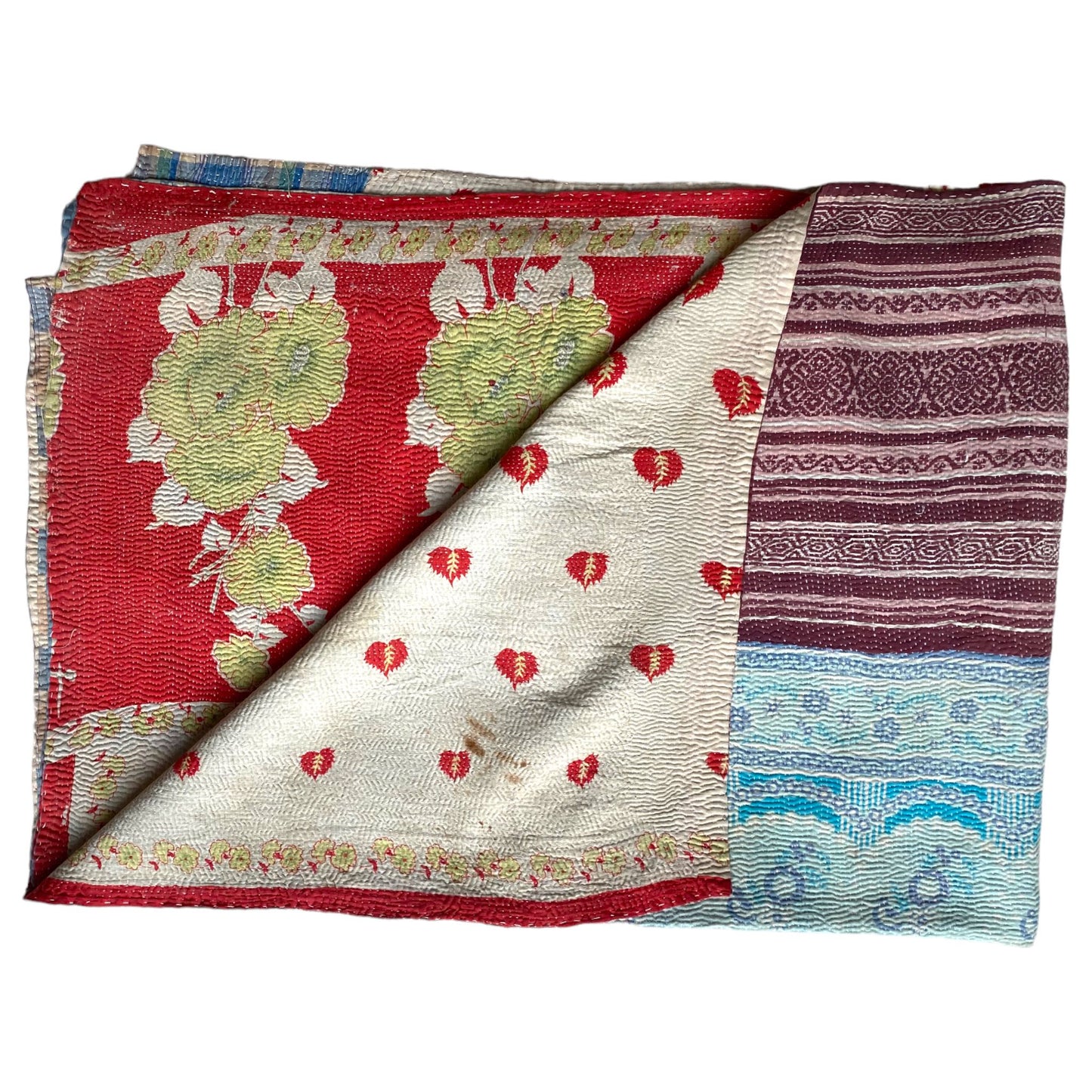 Red and white kantha quilt folded