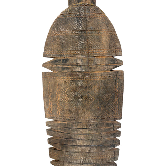 a close-up of a wooden hand carved decorative sculpture on a white background