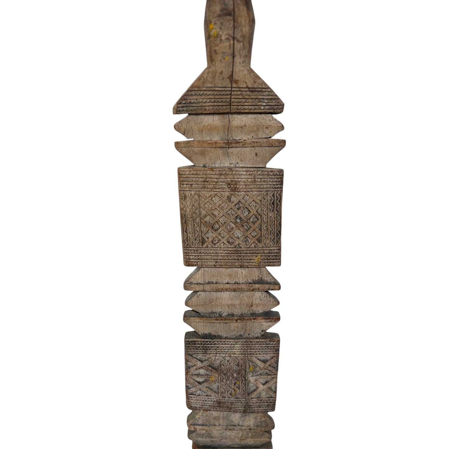 A hand-carved wooden decorative column segment with geometric patterns, shown against a plain white background.