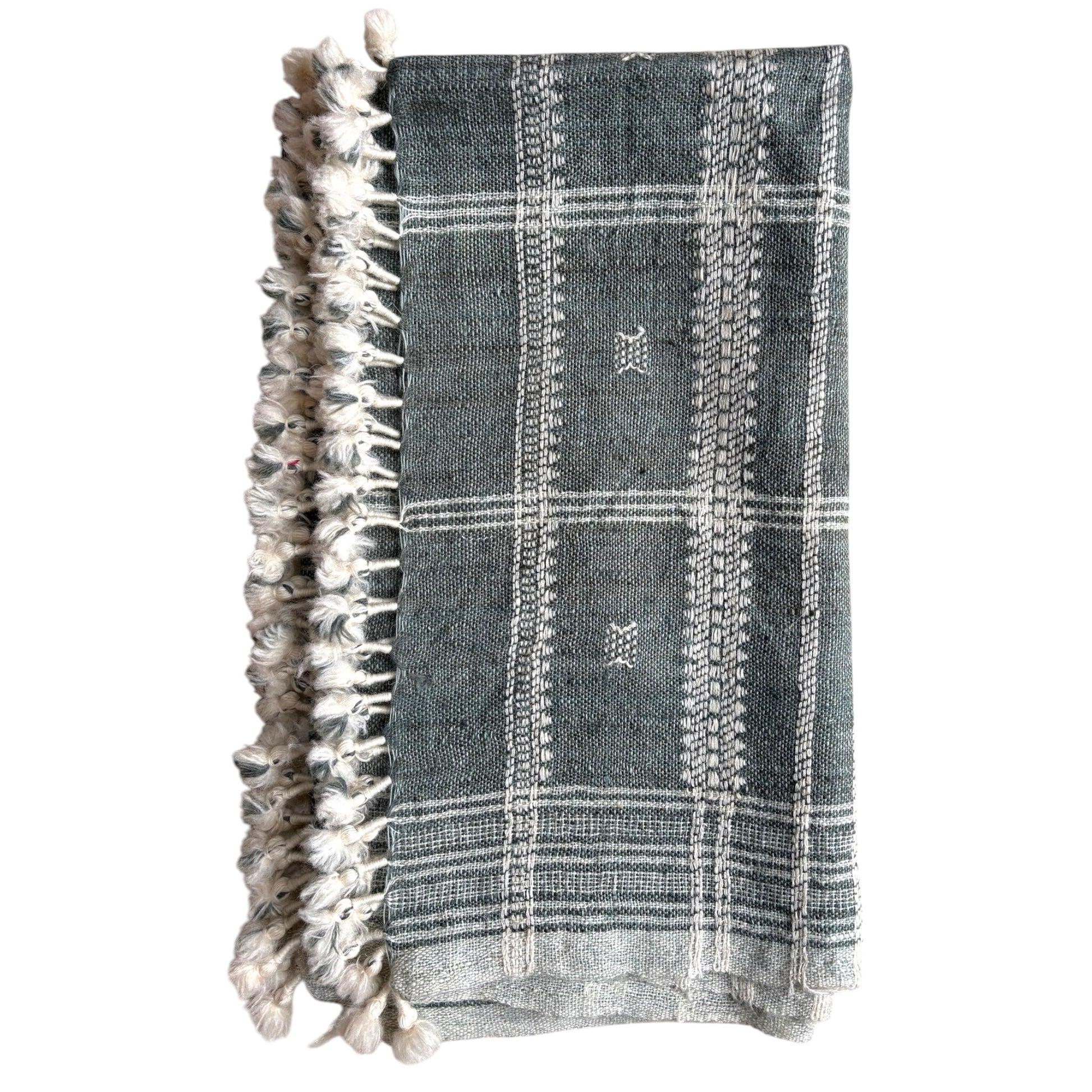 Slate grey woollen throw with tassels, folded