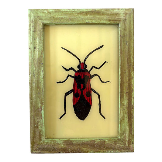 small red beetle glass painting