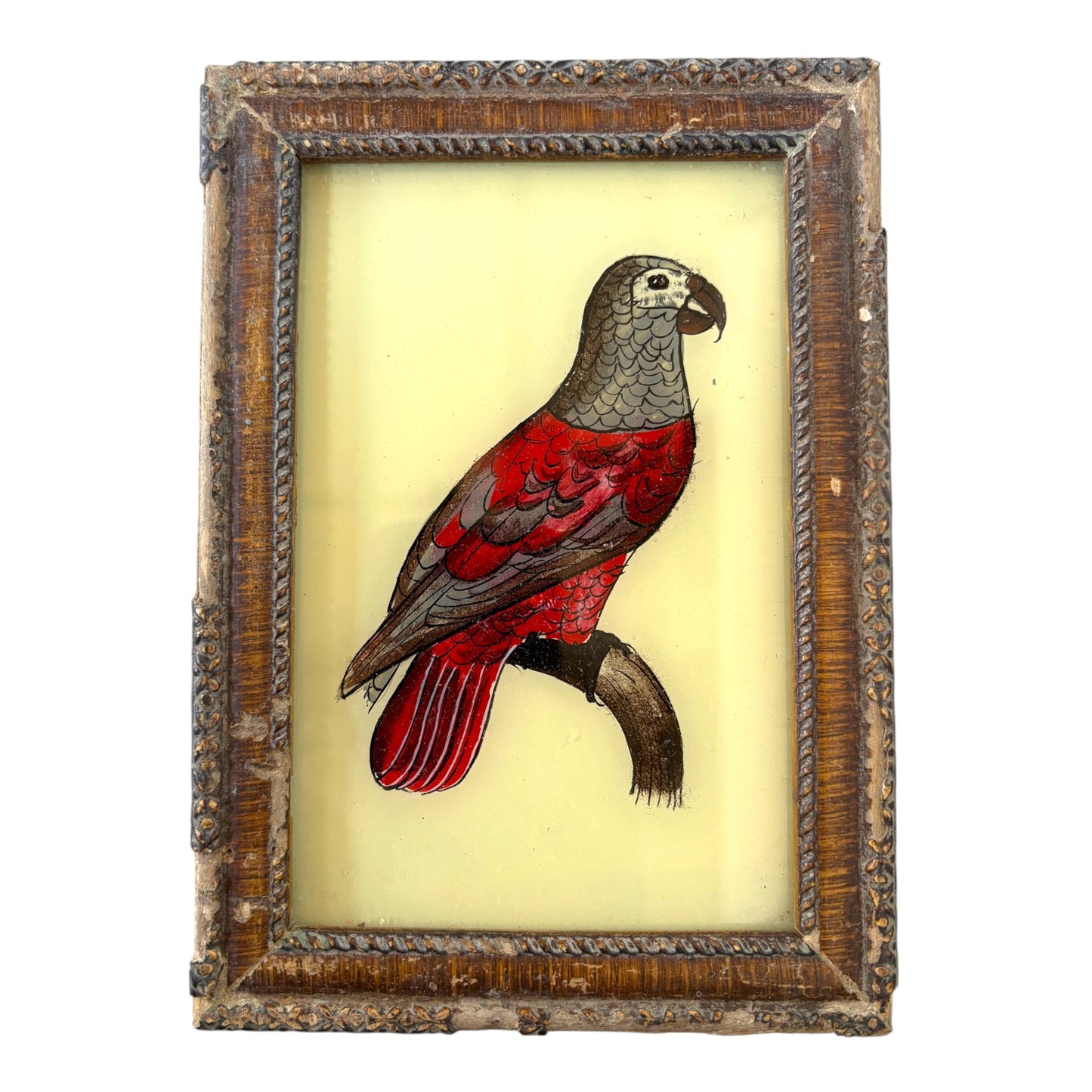 Small glass painting of a red parrot