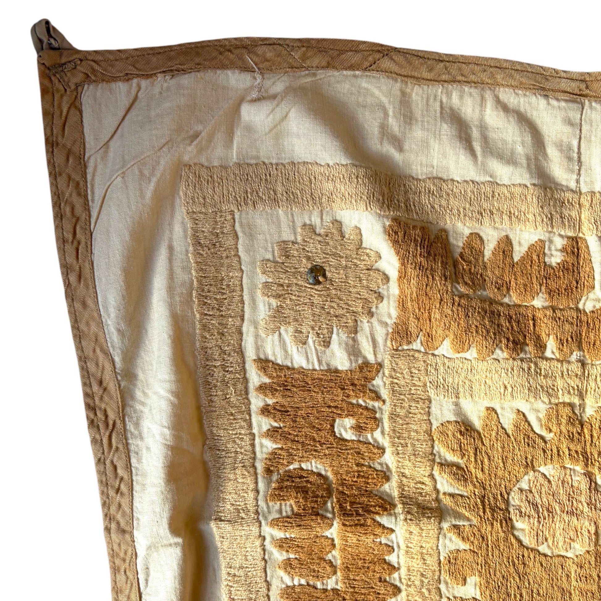 close up detail of square suzani